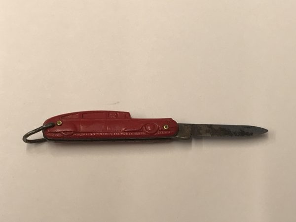 Vintage Richards of Sheffield red car figural pocket knife, blade open—alternate side shown with 1.5-inch steel blade and key-ring loop