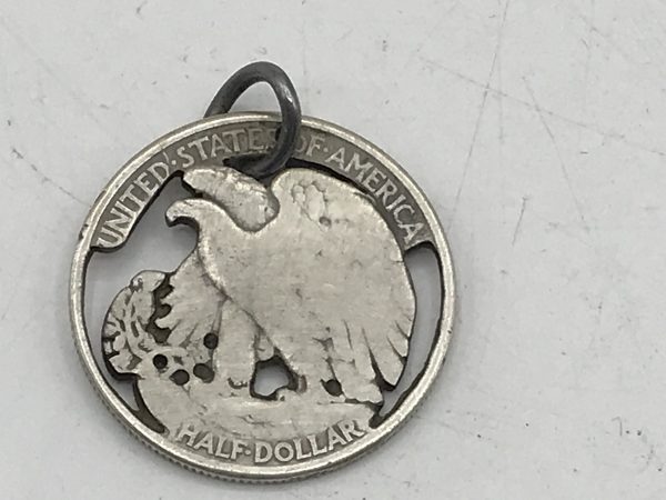USA Silver Half Doller Carved Into a Pendant