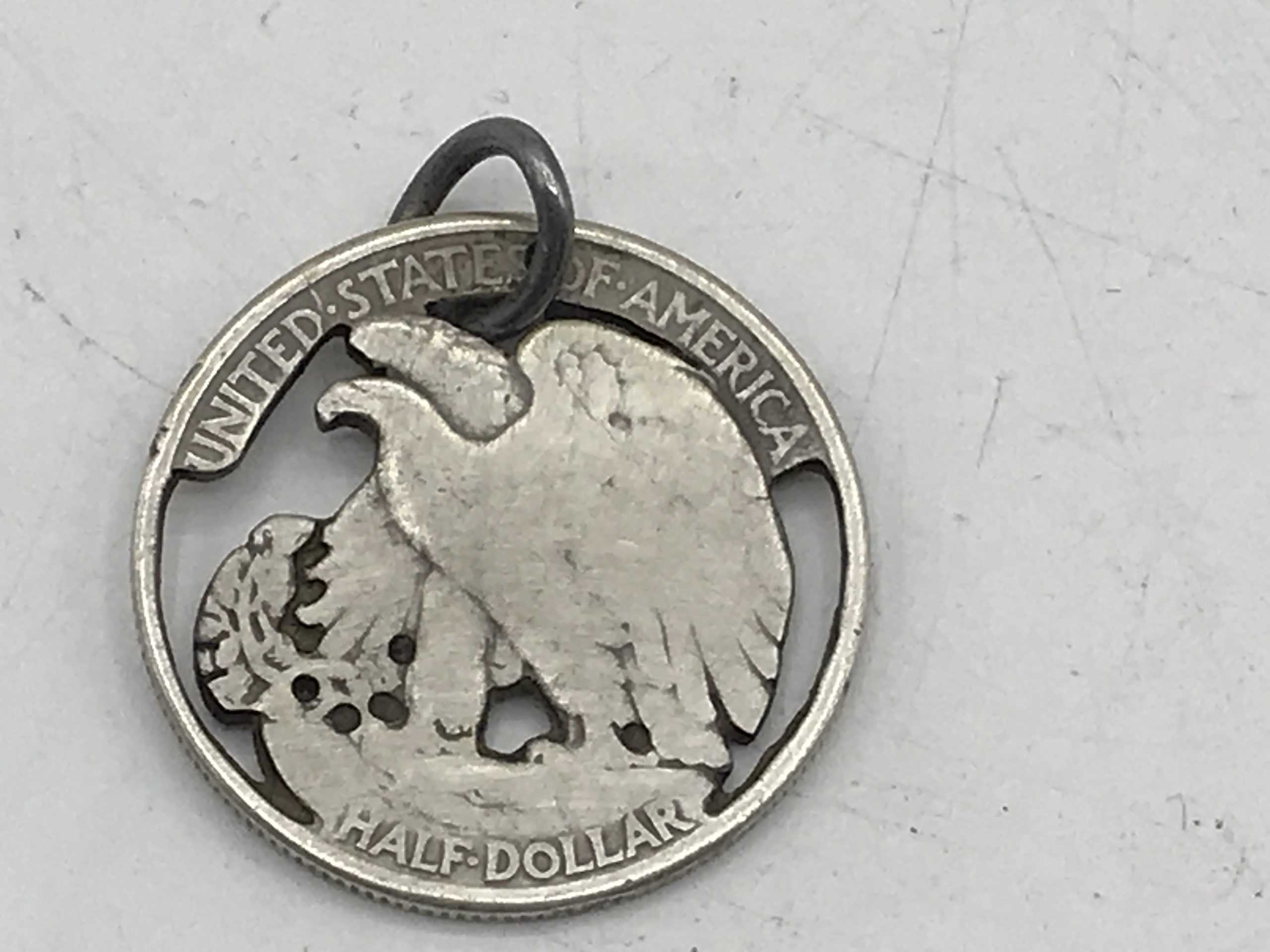 USA Silver Half Doller Carved Into a Pendant