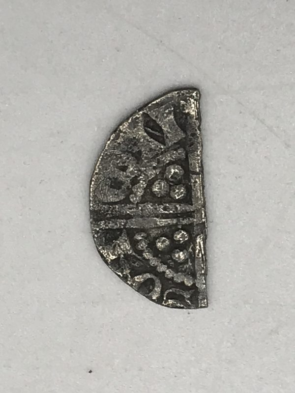 Early Half Cut Hammered Coin
