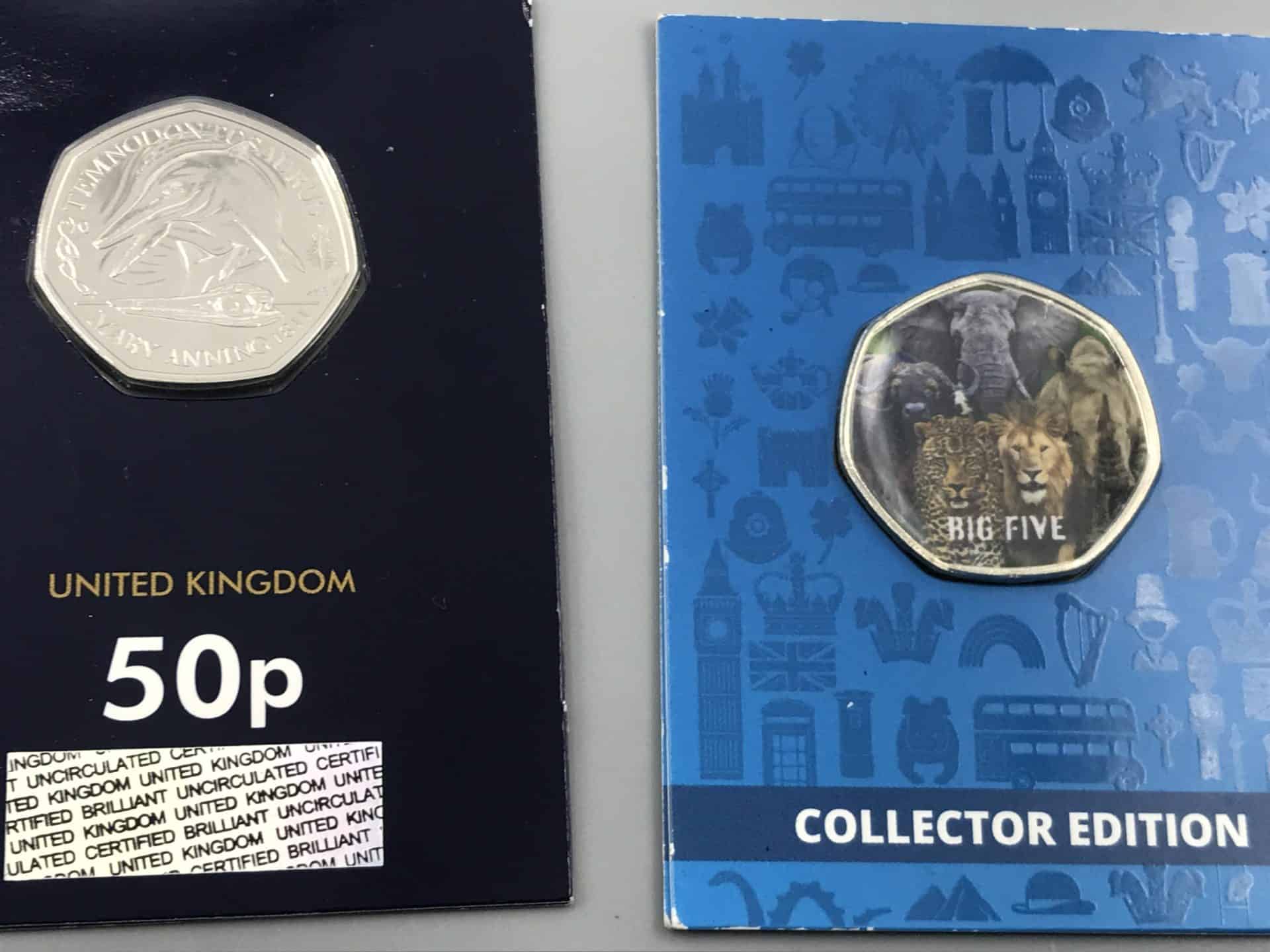 Two UK 50p coins in packaging—one Mary Anning Temnodontosaurus design and one Big Five collector edition with animals including lion, elephant, leopard, rhino, and buffalo