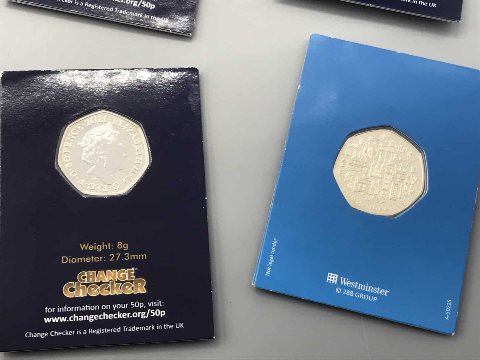 Two uncirculated UK 50p coins in presentation cards, one Change Checker 2021 coin and one Westminster collector edition with detailed reverse design