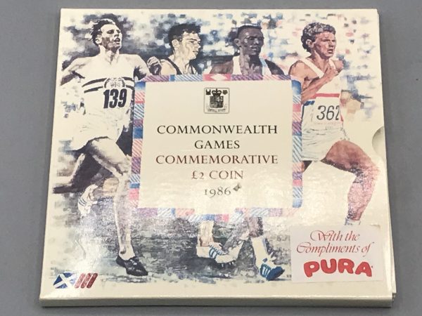 1986 Royal Mint £2 coin commemorating the XIII Commonwealth Games in Edinburgh, presented in original illustrated packaging