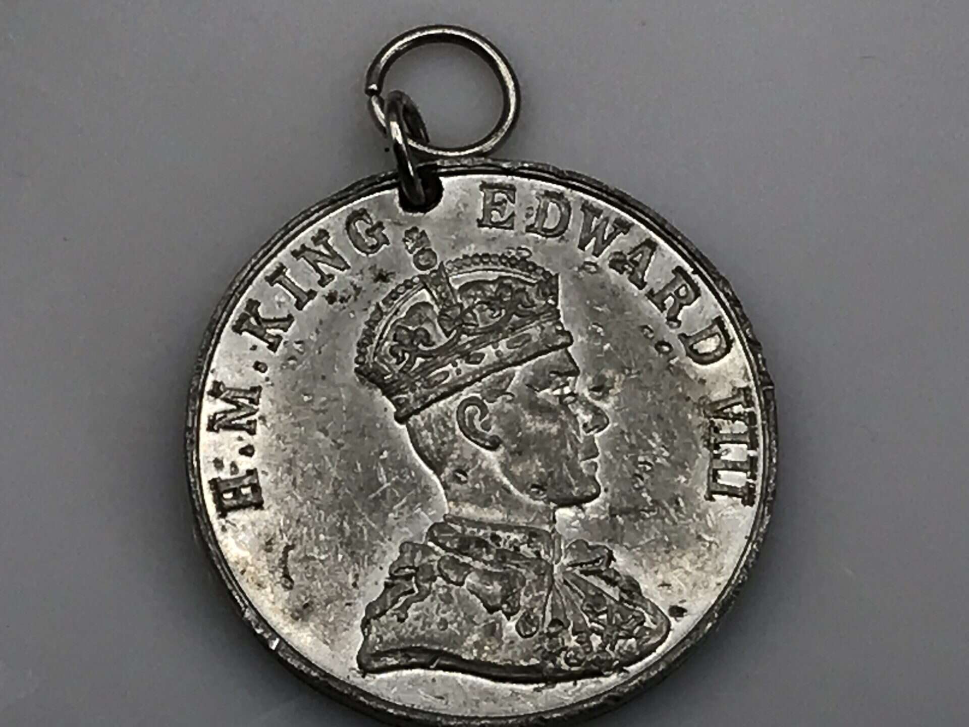 King Edward VIII coronation medal featuring a crowned portrait in profile