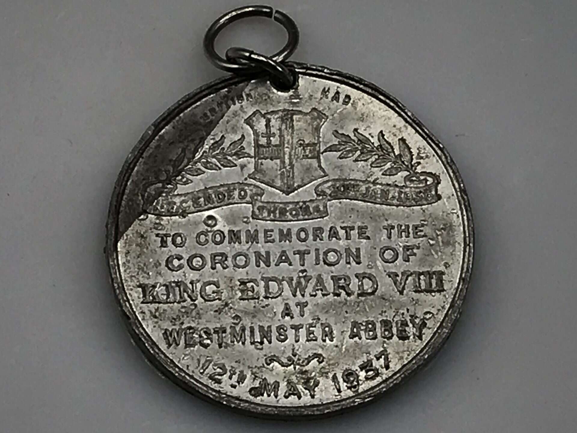 Vintage King Edward VIII coronation medal with engraved text and emblem