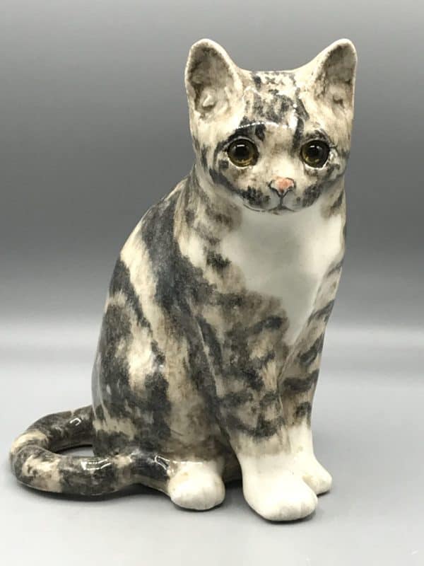 Winstanley pottery cat figurine with glass eyes, gray and white glaze
