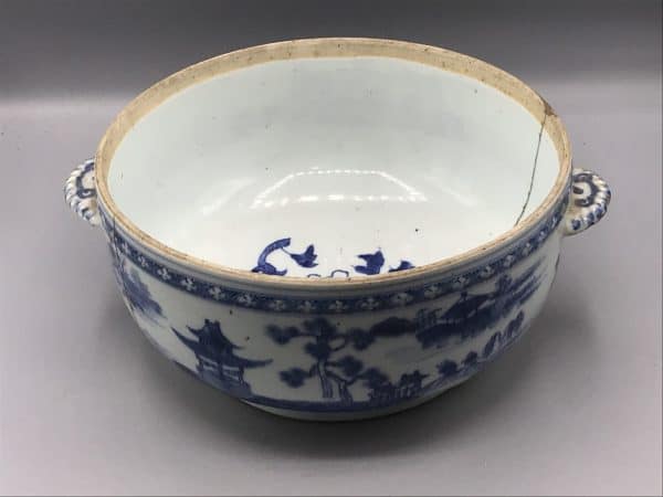 Elevated view of 18th century Chinese export porcelain tureen, Qianlong era, blue and white landscape design with twin side handles, 9 inches diameter by 4 inches tall