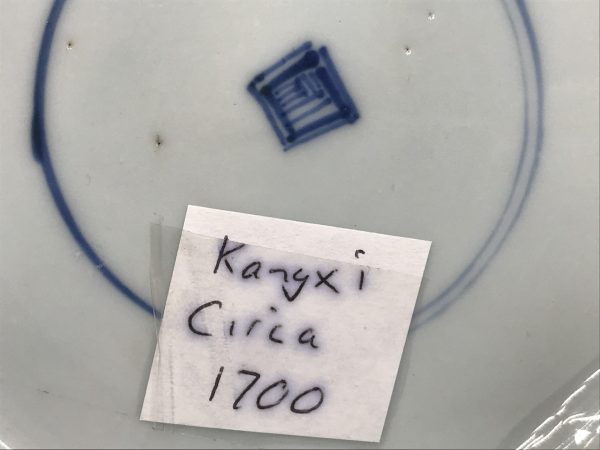 Close-up of Kangxi mark on back of 18th century Chinese porcelain plate, blue square within double circles circa 1700