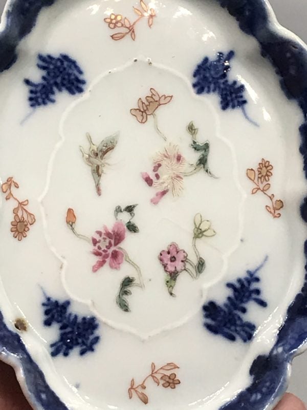 Interior of 18th century Chinese export porcelain dish, Qianlong period, with famille rose floral sprays and butterfly motif within scalloped rim