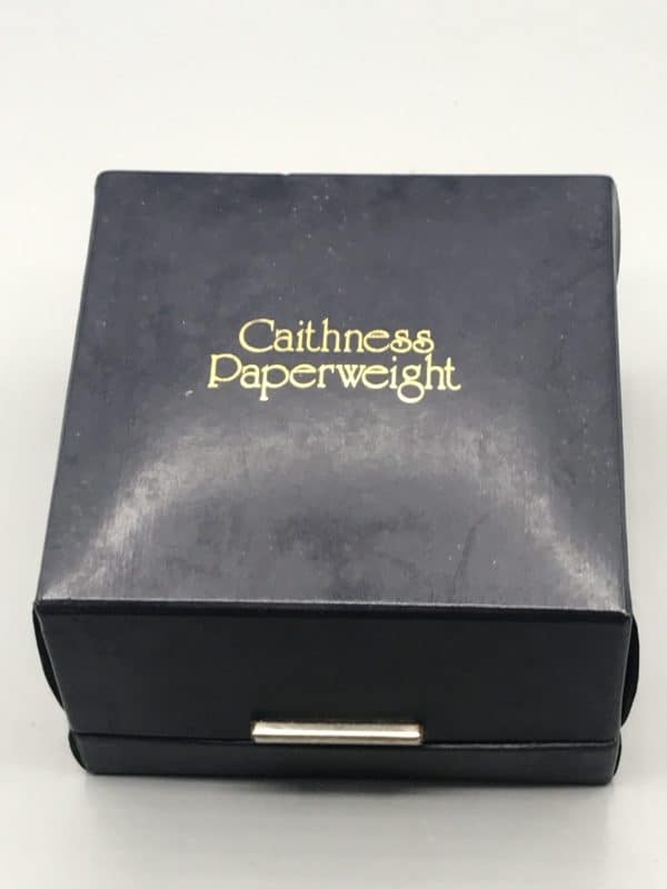Vintage Caithness Glass paperweight presentation box, navy blue with gold lettering, measuring approximately 4 inches square, closed view