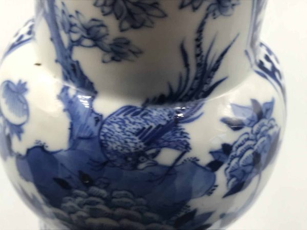 Close-up of blue and white bird and floral motif on late 19th century Chinese porcelain gu-form vase, Guangxu period
