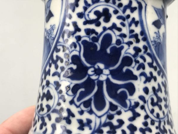 Close-up of scrolling foliate pattern in underglaze blue on late 19th century Chinese Kangxi revival porcelain vase