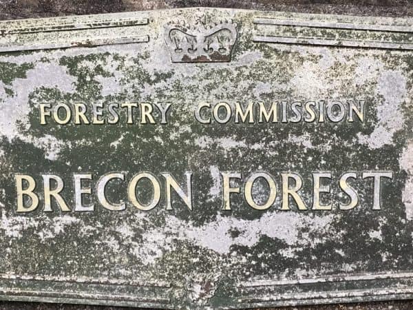 Close-up of embossed lettering on cast aluminium Forestry Commission Brecon Forest sign, mid 20th century