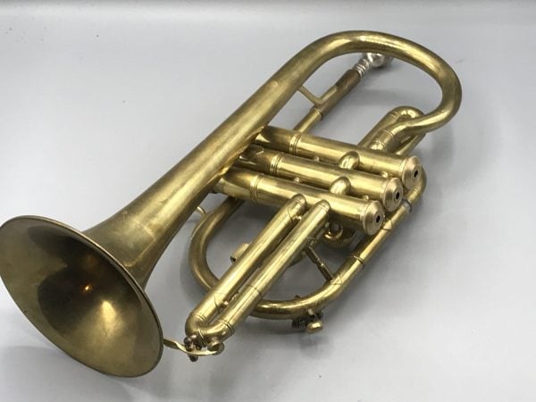 Alternate front view of vintage brass cornet by Lark Shanghai China, mid-20th century, showing bell and valve layout