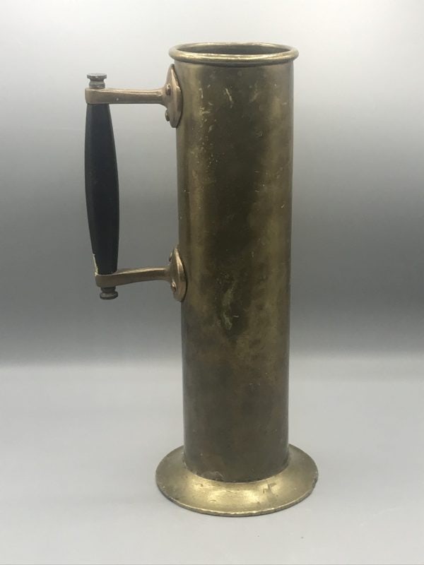 Full side view of an antique brass salinometer boiler test pot with ebony handle, late 19th to early 20th century maritime engineering piece measuring 12 inches tall