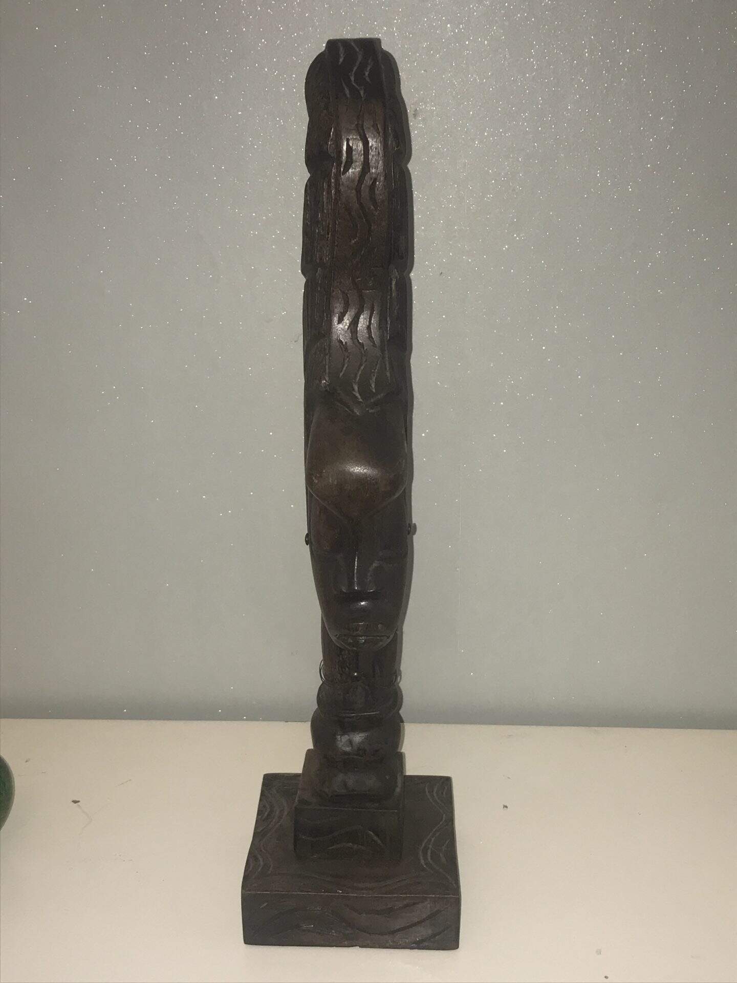 Antique carved wood African female bust in Benin style with tall headdress, standing 23 inches tall, front-facing view