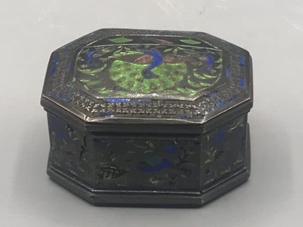 Antique silver enamel snuff box, back view, showing colorful bird and floral motifs with enamel loss