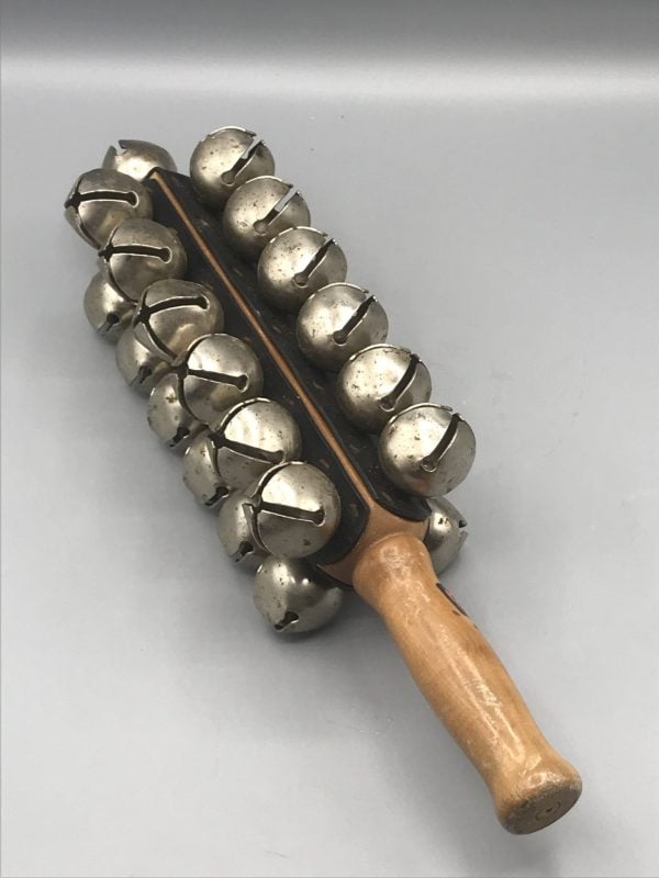 Vintage Dixon sleigh bells percussion instrument made in Taiwan, featuring a pine wood handle and two rows of metal bells, measuring approximately 13.5 inches long.