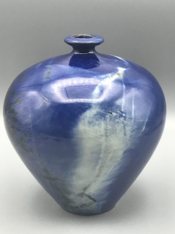 Modern studio pottery vase by Planas Marquès, Pals Spain, showing a deep cobalt blue glaze with pale streaking and a narrow neck, approximately 6.5 inches tall.