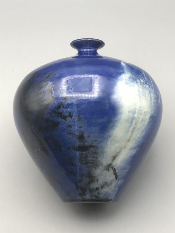 Modern studio pottery vase by Planas Marquès, Pals Spain, finished in a rich cobalt blue glaze with pale white and smoky accents, approximately 6.5 inches tall.