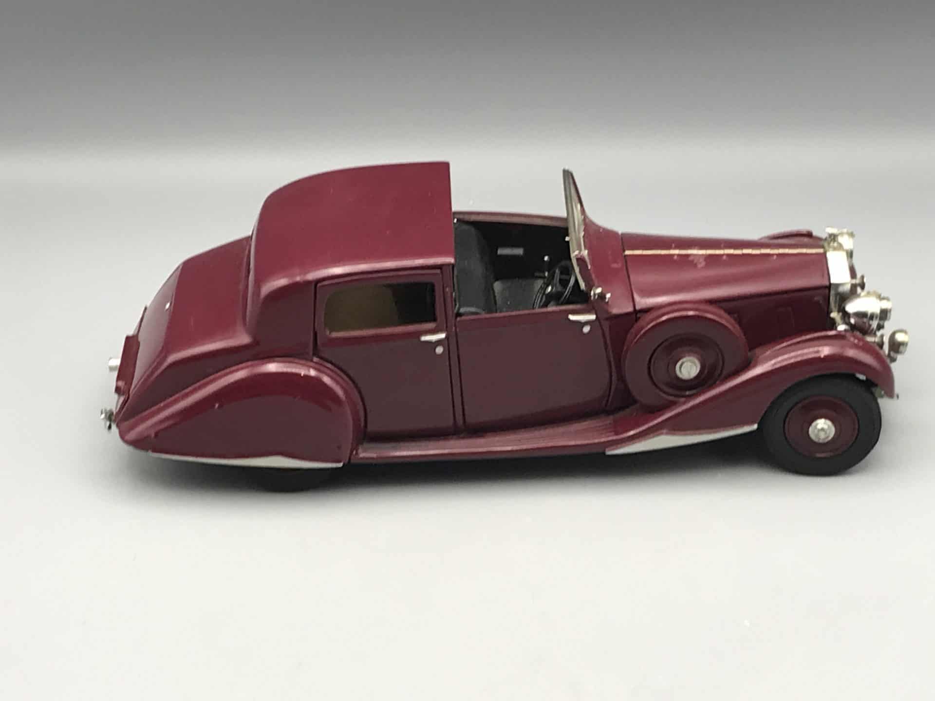 Alternate side view of Danbury Mint 1938 Rolls-Royce Phantom III Sedanca de Ville die-cast model in garnet finish
