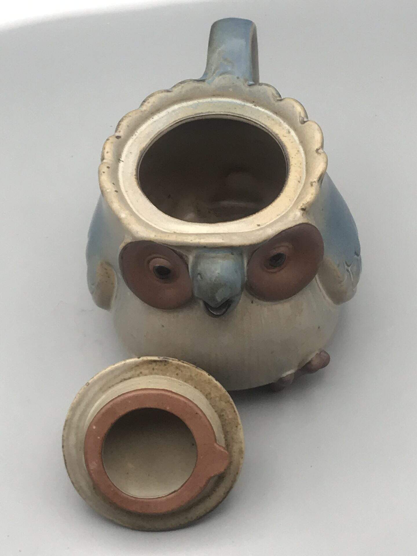 Open Kashiwa Craft Seto ware owl teapot showing interior and detached lid, Japanese stoneware with matte glaze, 5.5 inches tall