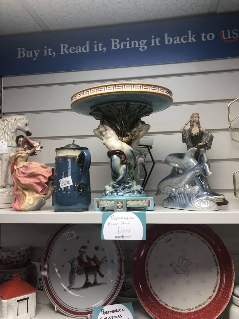 Victorian Minton majolica comport displayed in a charity shop and mislabelled as a reproduction for £39.99