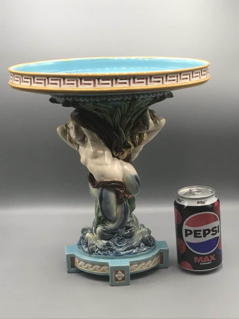 Victorian Minton majolica centrepiece shown next to a drinks can for size comparison