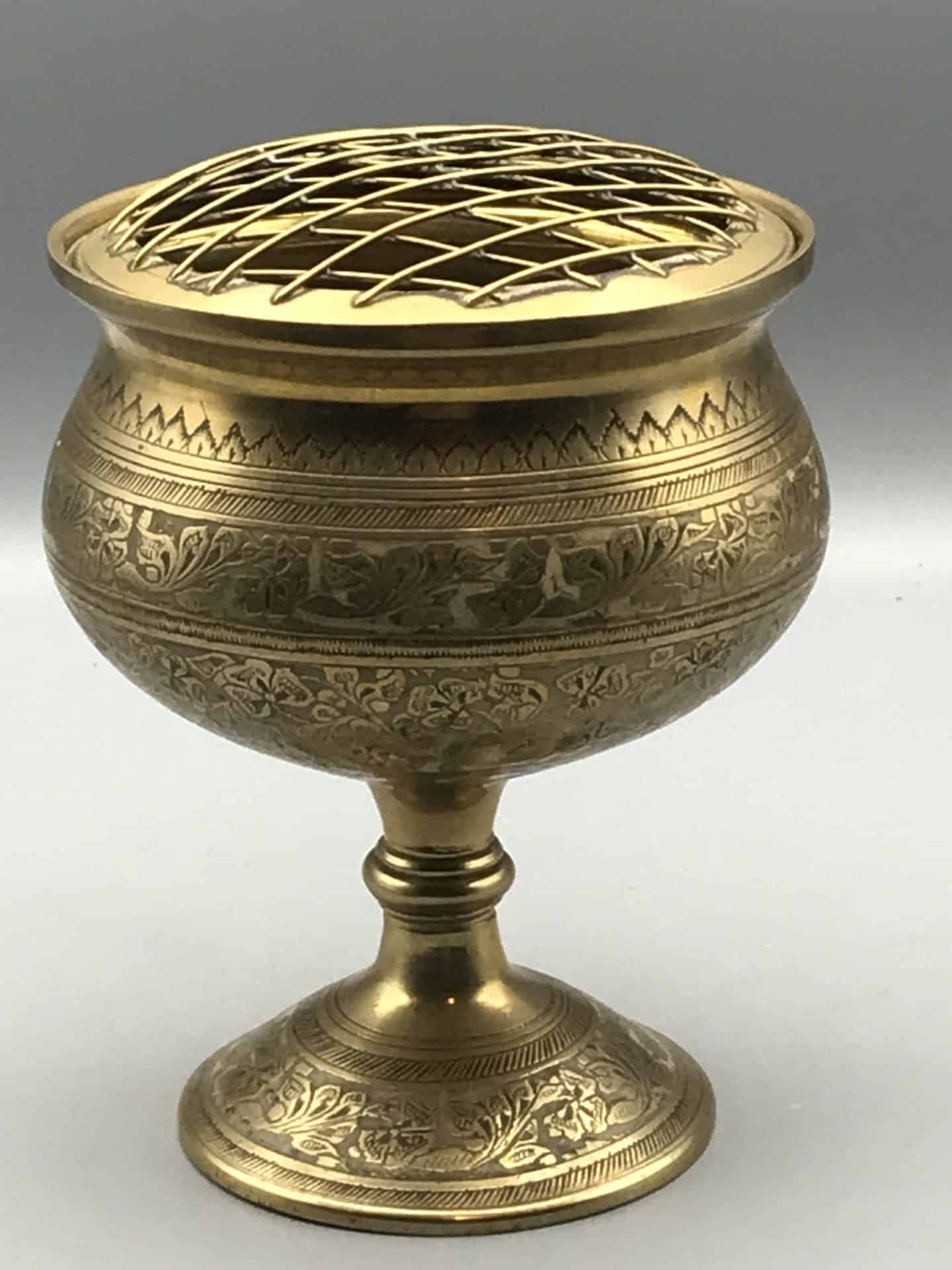 Antique Indian brass rose bowl with hand engraved floral decoration and lattice top, standing 6.5 inches tall