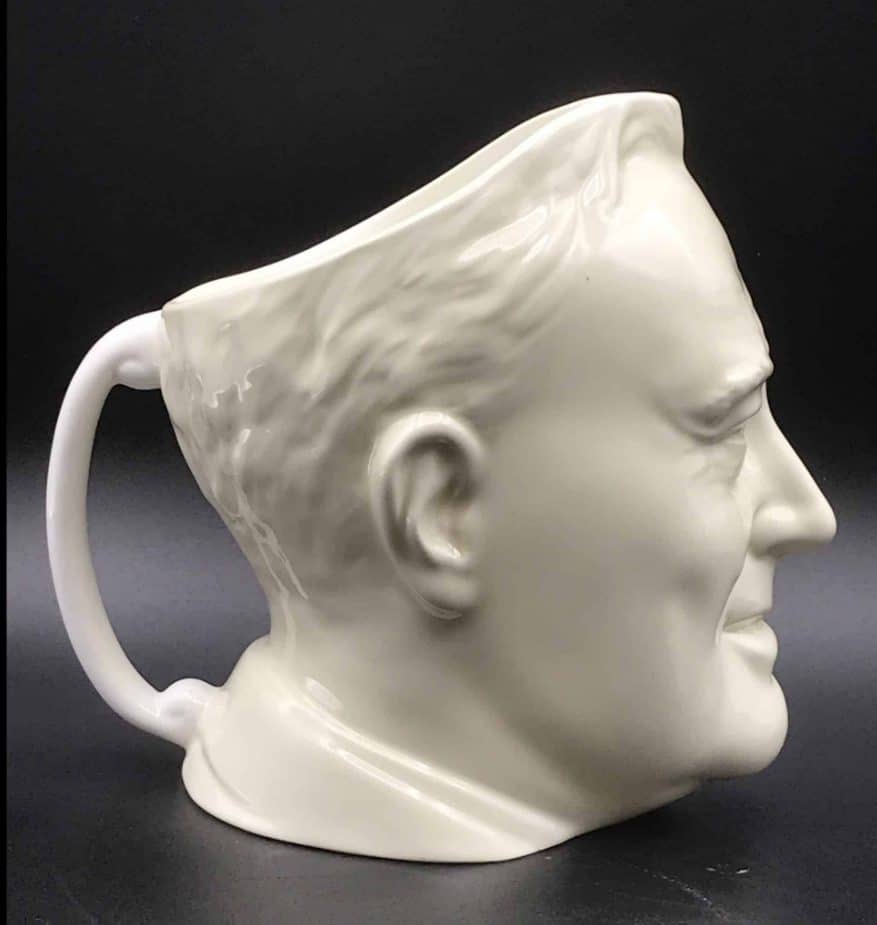 Side profile view of a Minton porcelain character jug depicting President Roosevelt