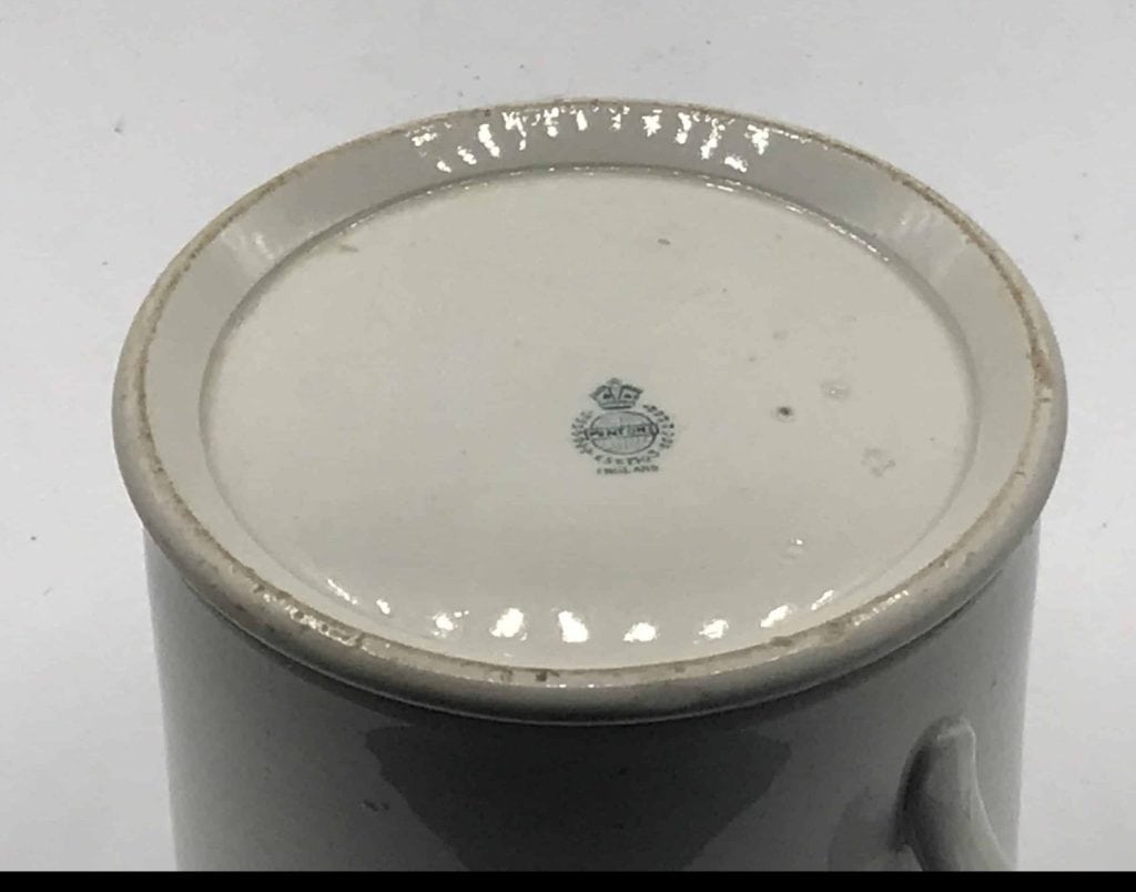 Base of English pottery tankard showing impressed Mintons factory mark